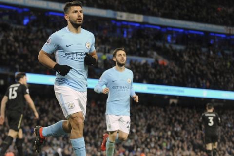 Manchester City's Sergio Aguero, front left, celebrates after scoring his side's second goal during the English Premier League soccer match between Manchester City and Leicester City at the Etihad Stadium in Manchester, England, Saturday, Feb. 10, 2018. (AP Photo/Rui Vieira)