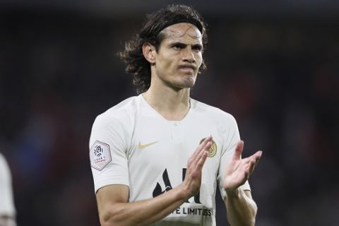 PSG's Edinson Cavani applauds spectators after the French League One soccer match between Rennes and Paris Saint Germain, in Rennes, Sunday, Aug. 18, 2019. Rennes won the match 2-1. (AP Photo/David Vincent)