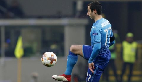 Arsenal's Henrikh Mkhitaryan controls the ball during an Europa League round of 16, first leg, soccer match between AC Milan and Arsenal at the San Siro stadium in Milan, Italy, Friday, March 9, 2018. (AP Photo/Antonio Calanni)