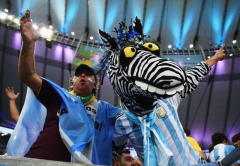 RIO DE JANEIRO, BRAZIL - JUNE 15:  Argentina fans show support prior to the 2014 FIFA World Cup Brazil Group F match between Argentina and Bosnia-Herzegovina at Maracana on June 15, 2014 in Rio de Janeiro, Brazil.  (Photo by Matthias Hangst/Getty Images)