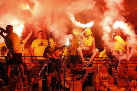 Supporters of Brondby light fireworks during the Europe League third qualifying round first leg soccer match between Hertha BSC and Brondby IF in Berlin, Germany, Thursday, July 28, 2016. (AP Photo/Michael Sohn)