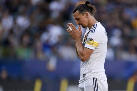 LA Galaxy forward Zlatan Ibrahimovic reacts after missing a pass during the first half of an MLS soccer match against Vancouver Whitecaps FC in Carson, Calif., Sunday, Sept. 29, 2019. (AP Photo/Kelvin Kuo)
