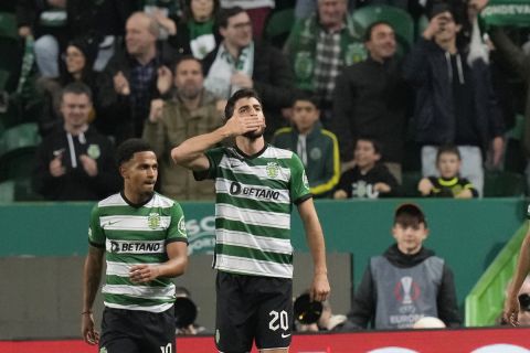 Sporting's Paulinho celebrates after scoring his side's second goal during the Europa League round of 16, first leg, soccer match between Sporting CP and Arsenal at the Alvalade stadium in Lisbon, Thursday, March 9, 2023. (AP Photo/Armando Franca)