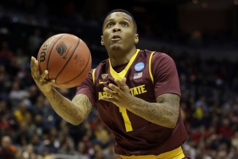 Arizona State guard Jahii Carson (1) drives to the basket during the first half of a second round NCAA college basketball tournament game against the Texas Thursday, March 20, 2014, in Milwaukee. (AP Photo/Morry Gash) 