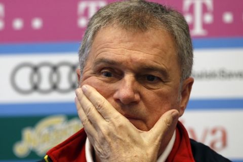 Montenegro coach Ljubisa Tumbakovic listens to a question during a press conference in Podgorica, Montenegro, Sunday March 24, 2019, ahead of the Euro 2020 group A qualifying soccer match between Montenegro and England on Monday. (AP Photo/Darko Vojinovic)