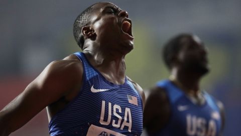 Christian Coleman, of the United States, wins the gold medal in the men's 100m final at the World Athletics Championships in Doha, Qatar, Saturday, Sept. 28, 2019. (AP Photo/Petr David Josek)