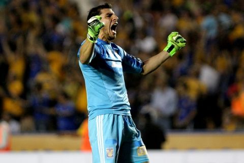 Goalie Nahuel Guzman, of Mexico's Tigres celebrates after his team scored against Argentina's River Plate during a Copa Libertadores soccer match in Monterrey, Mexico, Wednesday, April 8, 2015. (AP Photo/Alfredo Lopez)