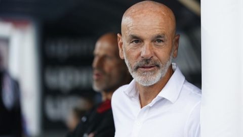 AC Milan's coach Stefano Pioli smiles prior to the Serie A soccer match between Lecce and AC Milan, at the Via del Mare stadium in Lecce, Italy, Monday, June 22, 2020. (Spada/LaPresse via AP)