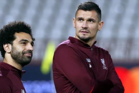 Liverpool forward Mohamed Salah, left, and defender Dejan Lovren attend a training session prior to the Champions League group C soccer match between Red Star and Liverpool, in Belgrade, Serbia, Monday, Nov. 5, 2018. Liverpool will face Red Star on Tuesday, Nov. 6. (AP Photo/Darko Vojinovic)