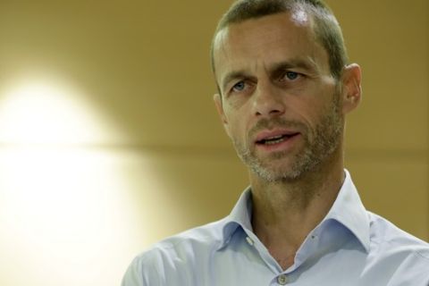Aleksander Ceferin, 49, head of the Slovenian Soccer Federation and candidate for the UEFA presidency speaks during an interview with the Associated Press in Athens, Tuesday, Sept. 13, 2016. European soccer federations will gather in the Greek capital on Wednesday to elect a new UEFA president to replace Michel Platini, who is serving a four-year ban from the sport. (AP Photo/Thanassis Stavrakis)