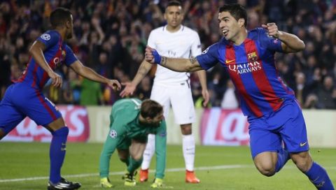 Barcelona's Luis Suarez celebrates scoring the opening goal during the Champion's League round of 16, second leg soccer match between FC Barcelona and Paris Saint Germain at the Camp Nou stadium in Barcelona, Spain, Wednesday March 8, 2017. (AP Photo/Manu Fernandez)