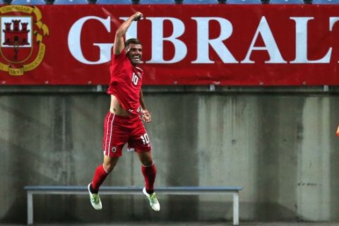 Gibraltar's Liam Walker celebrates after scoring his side's first goal during the World Cup Group H qualifying soccer match between Gibraltar and Greece outside Faro, southern Portugal, Tuesday, Sept. 6, 2016. (AP Photo/Armando Franca)