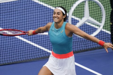 Caroline Garcia, of France, reacts after defeating Karolina Pliskova, of the Czech Republic, during the second round of the US Open tennis championships, Wednesday, Sept. 2, 2020, in New York. (AP Photo/Seth Wenig)