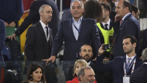 FILE - In this Wednesday, May 2, 2018 file photo, Roma club president James Pallotta, center, looks down from the stands during the Champions League semifinal second leg soccer match between Roma and Liverpool at the Olympic Stadium in Rome. Pallotta's joy over Roma reaching the Champions League semifinals last season quickly turned to despair when nine people were arrested in June for alleged corruption linked to bureaucratic matters involving the club's long-delayed plans to build a new stadium. (AP Photo/Alessandra Tarantino, File)