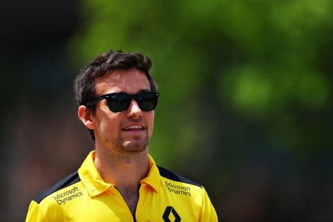 SHANGHAI, CHINA - APRIL 17: Jolyon Palmer of Great Britain and Renault Sport F1 in the Paddock ahead of the Formula One Grand Prix of China at Shanghai International Circuit on April 17, 2016 in Shanghai, China.  (Photo by Clive Mason/Getty Images)