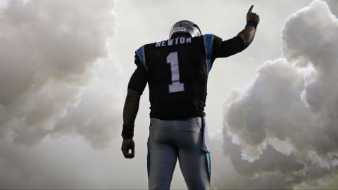 Carolina Panthers' Cam Newton (1) is introduced before an NFL football game against the Indianapolis Colts in Charlotte, N.C., Monday, Nov. 2, 2015. (AP Photo/Chuck Burton)