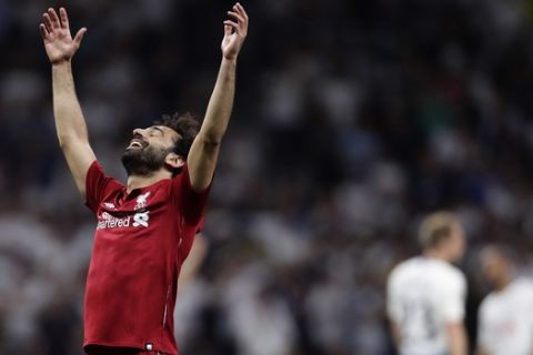 Liverpool's Mohamed Salah celebrates their victory after winning during the Champions League final soccer match between Tottenham Hotspur and Liverpool at the Wanda Metropolitano Stadium in Madrid, Saturday, June 1, 2019. (AP Photo/Manu Fernandez)