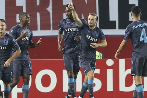 Trabzonspor's Abdulkadir Parmak, second right, celebrates his goal against Basel during a Europa League Group C soccer match between Trabzonspor and Basel in Trabzon, Turkey, Thursday, Oct. 3, 2019. (AP Photo)