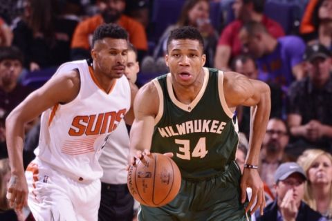 PHOENIX, AZ - FEBRUARY 4: Giannis Antetokounmpo #34 of the Milwaukee Bucks handles the ball against Phoenix Suns on February 4, 2017 at Talking Stick Resort Arena in Phoenix, Arizona. NOTE TO USER: User expressly acknowledges and agrees that, by downloading and or using this photograph, user is consenting to the terms and conditions of the Getty Images License Agreement. Mandatory Copyright Notice: Copyright 2017 NBAE (Photo by Barry Gossage/NBAE via Getty Images)