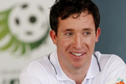 FILE - In this March 15, 2009 file photo, former English premier league football player Robbie Fowler answers questions at a news conference in Townsville, Australia. Ex-Liverpool forward Fowler has told Perth Glory he won't be returning for the next Australian A-League season. The West Australian club announced in a statement late Wednesday, June 1, 2011 that Fowler had contacted Glory chairman Tony Sage to say that he wouldn't be returning for another season due to family reasons. (AP Photo/Michael Chambers, File)