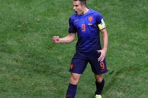 BRASILIA, BRAZIL - JULY 12: Robin van Persie of the Netherlands celebrates scoring his team's first goal on a penalty kick during the 2014 FIFA World Cup Brazil Third Place Playoff match between Brazil and the Netherlands at Estadio Nacional on July 12, 2014 in Brasilia, Brazil.  (Photo by Celso Junior/Getty Images)