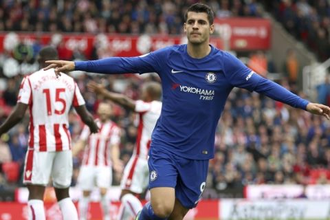Chelsea's Alvaro Morata celebrates scoring his side's first goal of the game during the English Premier League soccer match between Stoke City and Chelsea at the bet365 Stadium, Stoke-on-Trent, England, Saturday, Sept. 23, 2017. (Nigel French/PA via AP)