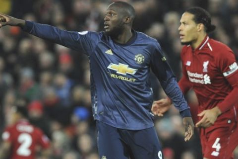 Manchester United's Romelu Lukaku gestures during the English Premier League soccer match between Liverpool and Manchester United at Anfield in Liverpool, England, Sunday, Dec. 16, 2018. (AP Photo/Rui Vieira)