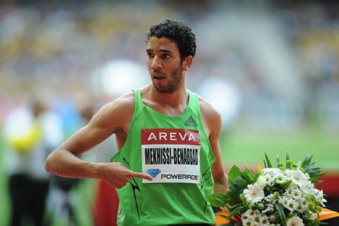 French runner Mahiedine Mekhissi-Benabbad reacts after winning the 3.000m steeple chase event at the IAAF Diamond League athletics Areva meeting, on July 8, 2011 at the Stade de France in Saint-Denis, a Paris northern suburb. AFP PHOTO / FRANCK FIFE (Photo credit should read FRANCK FIFE/AFP/Getty Images)