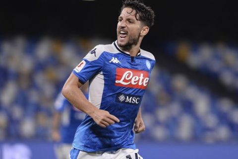 Napoli's Dries Mertens celebrates scoring his side's opening goal during the Italian Cup second leg semifinal soccer match between Napoli and Inter Milan, at the Naples San Paolo Stadium, Italy, Saturday, June 13, 2020. The match is being played without spectators because of the COVID-19 restriction measures. (Cafaro/LaPresse via AP)