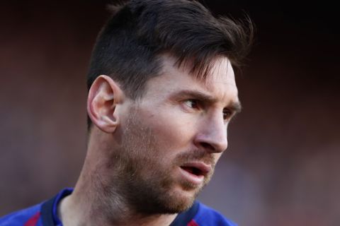 Barcelona's Lionel Messi looks on during a Spanish La Liga soccer match between FC Barcelona and Espanyol at the Camp Nou stadium in Barcelona, Spain, Saturday March 30, 2019. (AP Photo/Manu Fernandez)