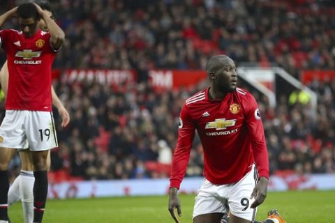 Manchester United's Romelu Lukaku shows his dejection after the final whistle of the English Premier League soccer match against West Bromwich Albion at Old Trafford, Manchester, England, Sunday April 15, 2018. (Nick Potts/PA via AP)