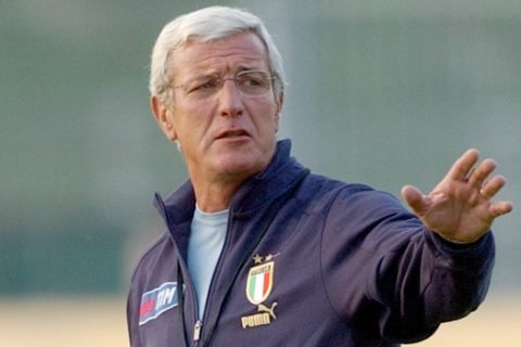 Marcelo Lippi, coach of the Italian national team, gives order to his players during training session in the eve of World Cup qualifying match against Slovenian national team, in Celje, Slovenia, Friday, Oct. 8, 2004. (AP Photo/Darko Bandic)