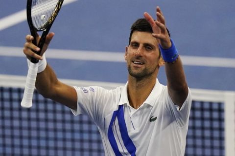 Novak Djokovic, of Serbia, celebrates winning his match against Roberto Bautista Agut, of Spain, during the semifinals at the Western & Southern Open tennis tournament Friday, Aug. 28, 2020, in New York. (AP Photo/Frank Franklin II)
