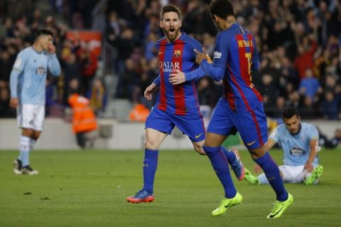 Barcelona's Lionel Messi, left, celebrates with teammate Neymar after scoring the opening goal against Celta during a Spanish La Liga soccer match between Barcelona and Celta at the Camp Nou stadium in Barcelona, Saturday, March 4, 2017. (AP Photo/Francisco Seco)