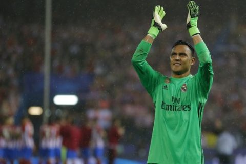 Real Madrid's goalkeeper Keylor Navas waves to his fans after the Champions League semifinal second leg soccer match between Atletico Madrid and Real Madrid at the Vicente Calderon stadium in Madrid, Spain, Wednesday, May 10, 2017. (AP Photo/Francisco Seco)