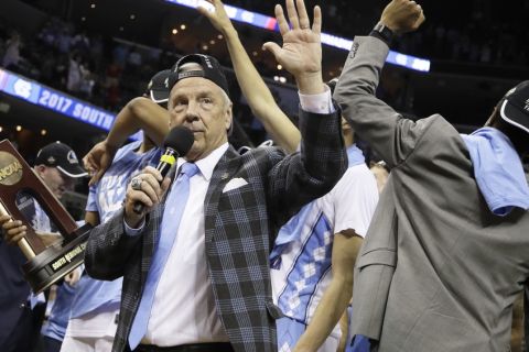 North Carolina head coach Roy Williams thanks the fans after North Carolina beat Kentucky 75-73 in the South Regional final game in the NCAA college basketball tournament Sunday, March 26, 2017, in Memphis, Tenn. (AP Photo/Mark Humphrey)