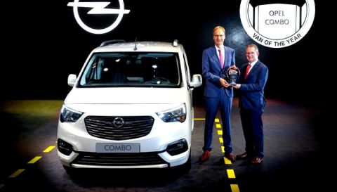 IVOTY 2019 - Opel/Vauxhall trophy handover photo with Jarlath Sweeney (right) and Michael Lohscheller