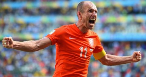 FORTALEZA, BRAZIL - JUNE 29:  Arjen Robben of the Netherlands celebrates after defeating Mexico 2-1 during the 2014 FIFA World Cup Brazil Round of 16 match between Netherlands and Mexico at Castelao on June 29, 2014 in Fortaleza, Brazil.  (Photo by Laurence Griffiths/Getty Images)