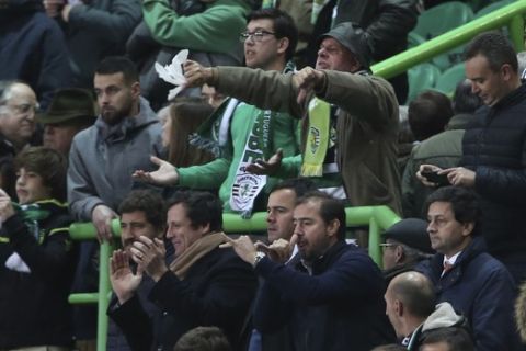 A Sporting fan shows his discontent after his team lost with a 0-1 score in the Europa League round of 32, first leg, soccer match between Sporting CP and Villarreal at the Alvalade stadium in Lisbon, Thursday, Feb. 14, 2019. (AP Photo/Armando Franca)