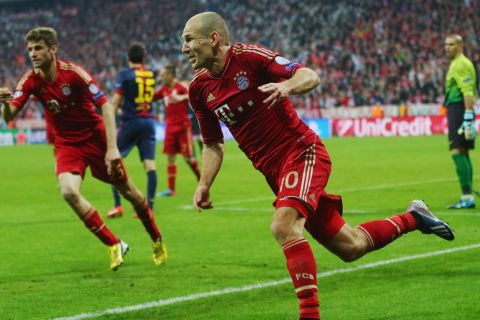 MUNICH, GERMANY - APRIL 23:  Arjen Robben of Bayern Muenchen celebrates scoring the third goal during the UEFA Champions League Semi Final First Leg match between FC Bayern Muenchen and Barcelona at Allianz Arena on April 23, 2013 in Munich, Germany.  (Photo by Alex Grimm/Bongarts/Getty Images)