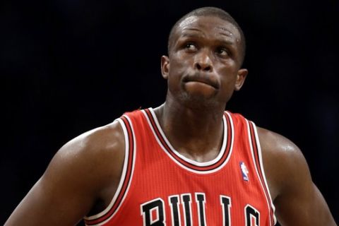 Chicago Bulls forward Luol Deng (9) reacts in the second half of Game 5 of their first-round NBA basketball playoff series against the Brooklyn Nets, Monday, April 29, 2013, in New York. The Nets won 110-91. (AP Photo/Kathy Willens)