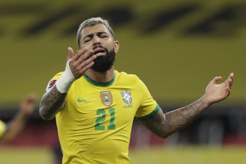 Brazil's Gabriel Barbosa reacts during a qualifying soccer match against Ecuador for the FIFA World Cup Qatar 2022 at Beira-Rio stadium in Porto Alegre, Brazil, Friday, June 4, 2021. (AP Photo/Andre Penner)