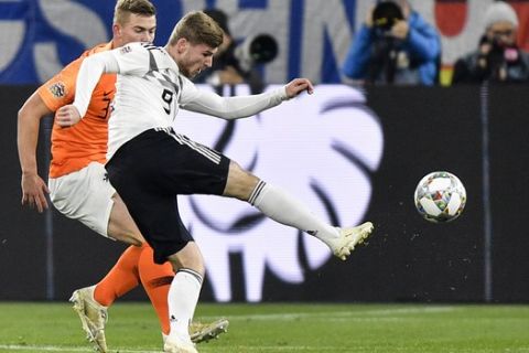 Germany's Timo Werner scores the opening goal during the UEFA Nations League soccer match between Germany and The Netherlands in Gelsenkirchen, Monday, Nov. 19, 2018. (AP Photo/Martin Meissner)