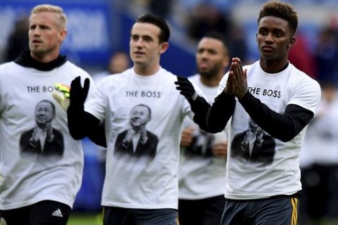 Leicester City's players wear a Vichai Srivaddhanaprabha shirt that reads 'The Boss' during the warm-up before kick-off of the English Premier League soccer match between Cardiff City and Leicester City at the Cardiff City Stadium, Cardiff. Wales. Saturday Nov. 3, 2018. (Simon Galloway/PA via AP)