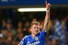 LONDON, ENGLAND - APRIL 08:  Andre Schurrle of Chelsea celebrates scoring their first goal during the UEFA Champions League Quarter Final second leg match between Chelsea and Paris Saint-Germain FC at Stamford Bridge on April 8, 2014 in London, England.  (Photo by Julian Finney/Getty Images)