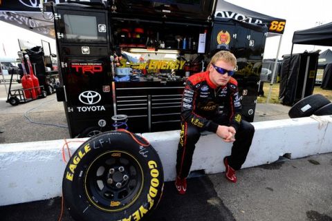 INDIANAPOLIS - JULY 30:  Steve Wallace, driver of the #66 5-Hour Energy Toyota sits in the garage area, during practice for the NASCAR Nationwide Series Kroger 200 at Lucas Oil Raceway on July 30, 2011 in Indianapolis, Indiana. (Photo by Jason Smith/Getty Images for NASCAR)