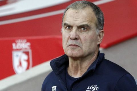 Lille coach Marcelo Bielsa looks on before their French League one soccer match against Marseille at the Lille Metropole stadium, in Villeneuve d'Ascq, northern France, Sunday, Oct. 29, 2017. (AP Photo/Michel Spingler)