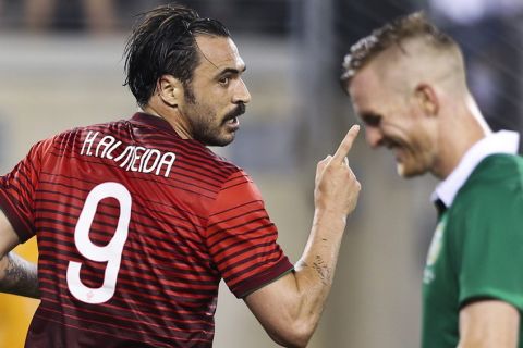 epa04248884 Portugal's Hugo Almeida (L) celebrates a goal during the international friendly preparation soccer match between the Republic of Ireland and Portugal at the Metlife Stadium in East Rutherford, New Jersey, USA, 10 June 2014. The FIFA World Cup 2014 will kick off on 12 June.  EPA/JOSE SENA GOULAO