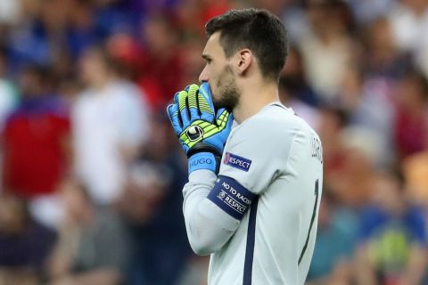 France goalkeeper Hugo Lloris reacts during the Euro 2016 final soccer match between Portugal and France at the Stade de France in Saint-Denis, north of Paris, Sunday, July 10, 2016. (AP Photo/Petr David Josek)