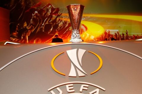 The Europa League trophy is displayed, during the Europa League draw ceremony of the first round of the 2015/2016 Europa League, at the Grimaldi Forum, in Monaco, Friday, Aug. 28, 2015. (AP Photo/Claude Paris)